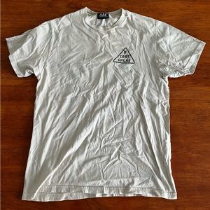 ‘ALC’ cream and designed t shirt.